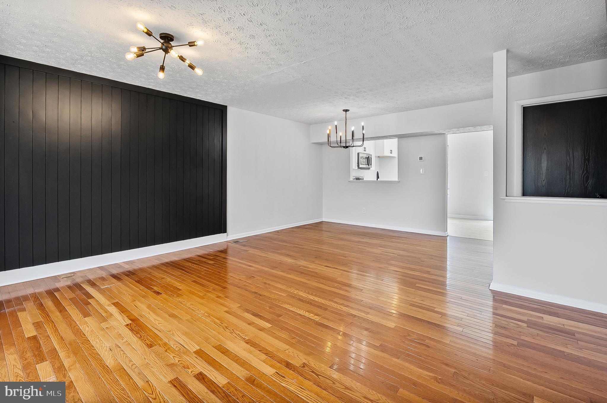 909 Olive Branch Court Edgewood, MD 21040 - Photo 9 of 36 a view of empty room with wooden floor
