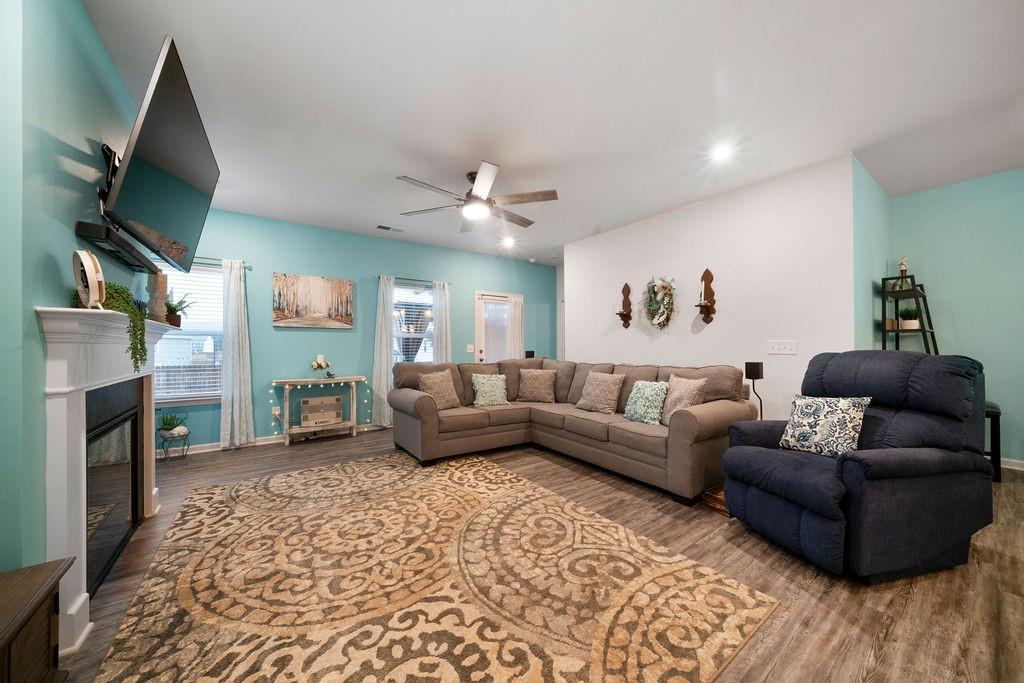 17 Brooke Court Southeast Rome, GA 30161 - Photo 19 of 32 a living room with furniture and a fireplace