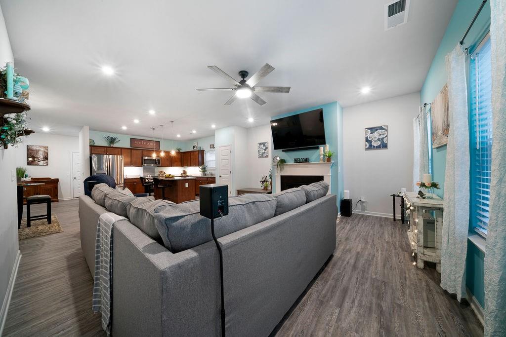 17 Brooke Court Southeast Rome, GA 30161 - Photo 21 of 32 a living room with furniture and a flat screen tv