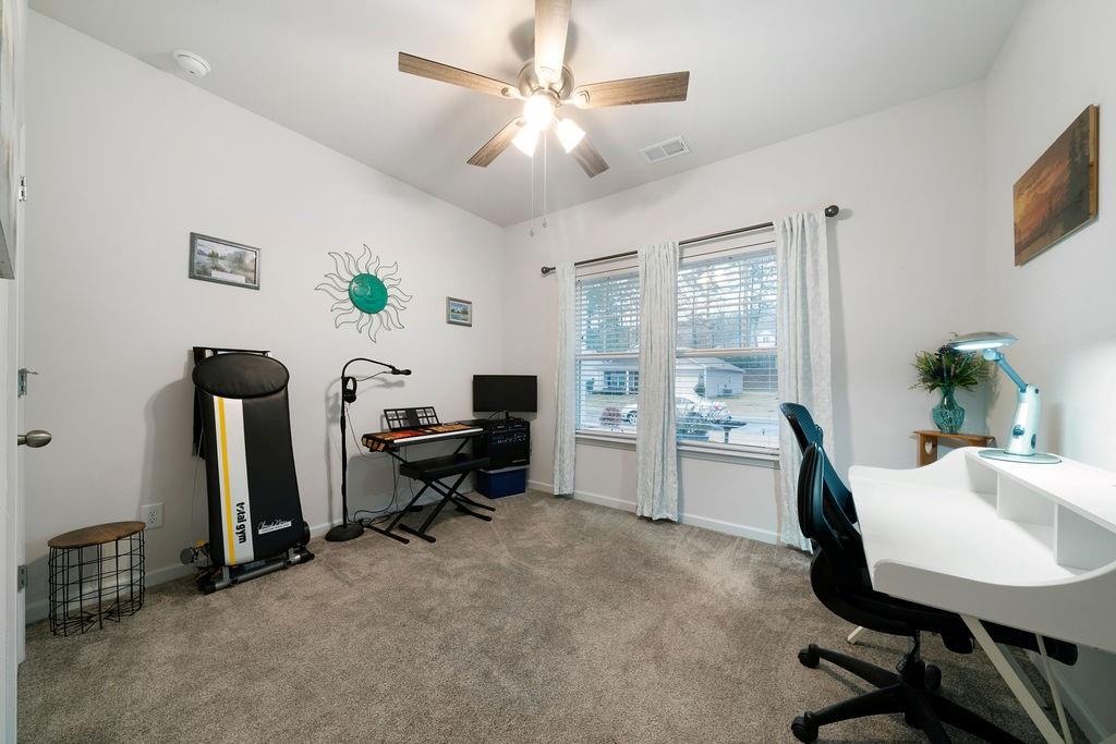 17 Brooke Court Southeast Rome, GA 30161 - Photo 4 of 32 a view of a workspace with furniture and a window