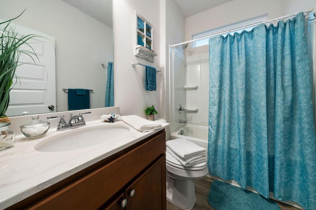 17 Brooke Court Southeast Rome, GA 30161 - Photo 5 of 32 a bathroom with a sink a toilet and shower