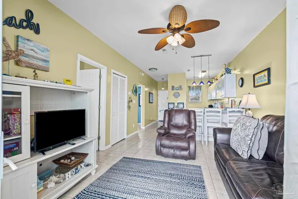 a bedroom with a bed dresser and a window