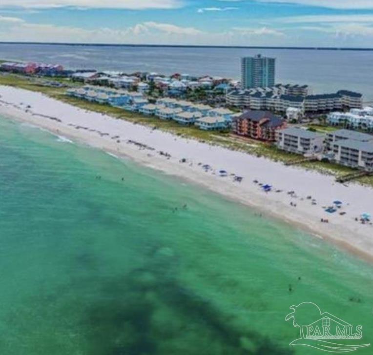 1150 Fort Pickens Road, Unit A1 Pensacola Beach, FL 32561 - Photo 45 of 45 a view of a lake with a beach
