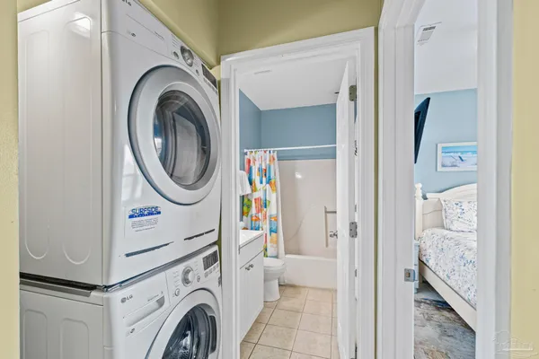 a bathroom with a sink a toilet and a shower