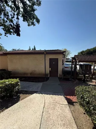 a house view with a outdoor space