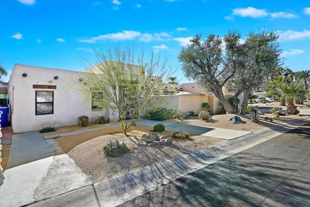 a building with trees in front of it