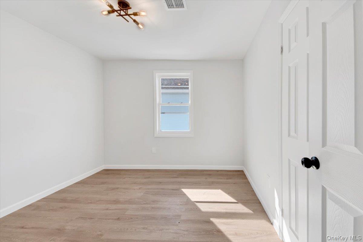 4626 Richardson Avenue, Unit 2 Bronx, NY 10470 - Photo 13 of 20 a view of an empty room with a window