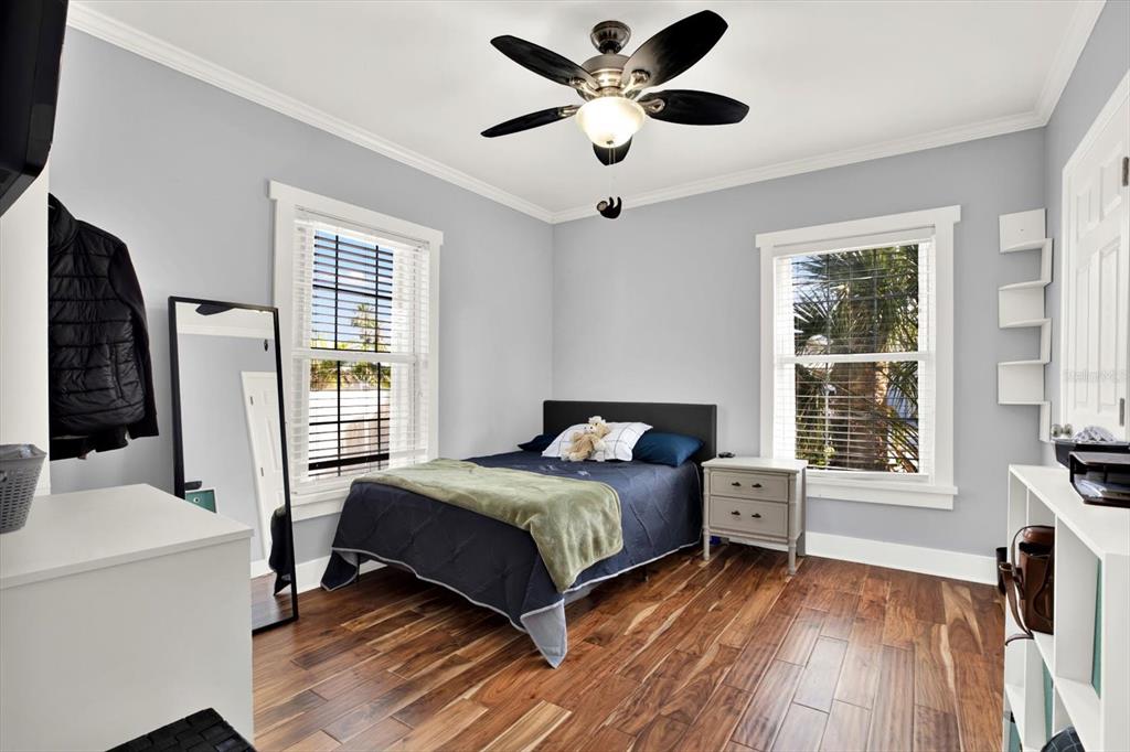 15656 1st Street East Redington Beach, FL 33708 - Photo 17 of 32 a bedroom with a bed and a window