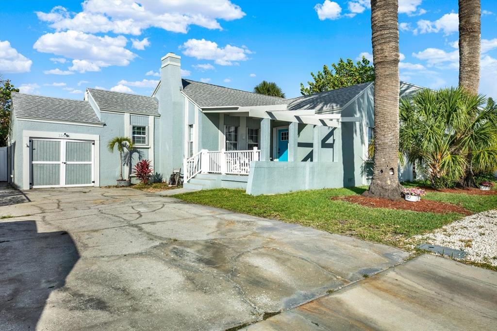 15656 1st Street East Redington Beach, FL 33708 - Photo 2 of 32 a view of a house with basketball court
