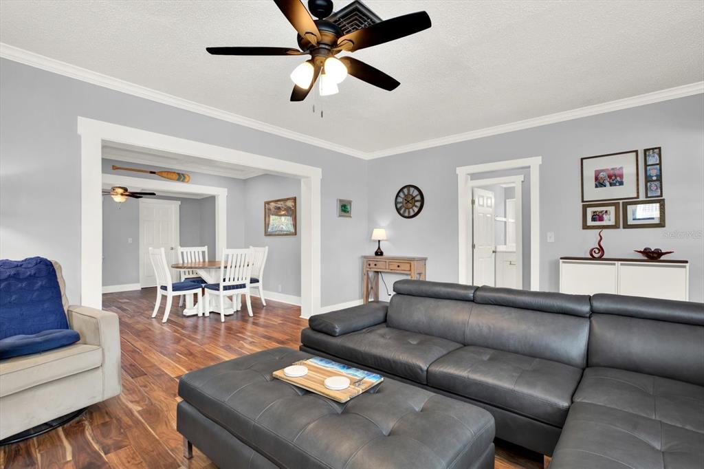 15656 1st Street East Redington Beach, FL 33708 - Photo 5 of 32 a living room with furniture and a large window
