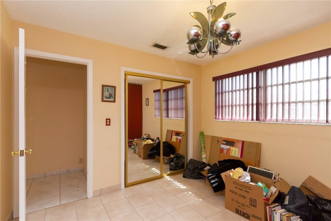 3300 Southwest 94th Court Miami, FL 33165 - Photo 16 of 18 a room with gym equipment