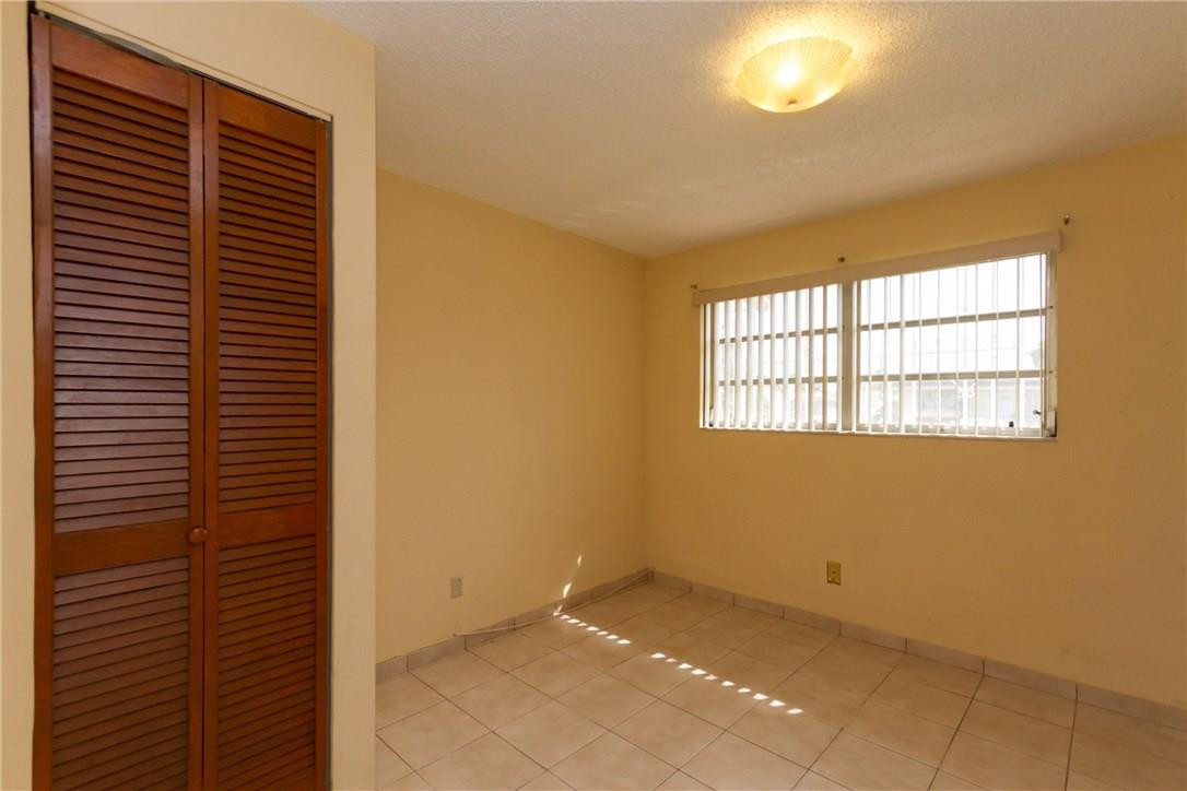 3300 Southwest 94th Court Miami, FL 33165 - Photo 17 of 18 a view of an empty room with a window