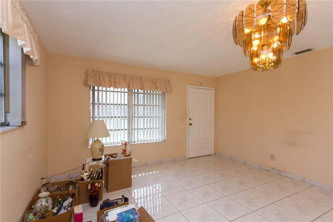 3300 Southwest 94th Court Miami, FL 33165 - Photo 3 of 18 an empty room with windows