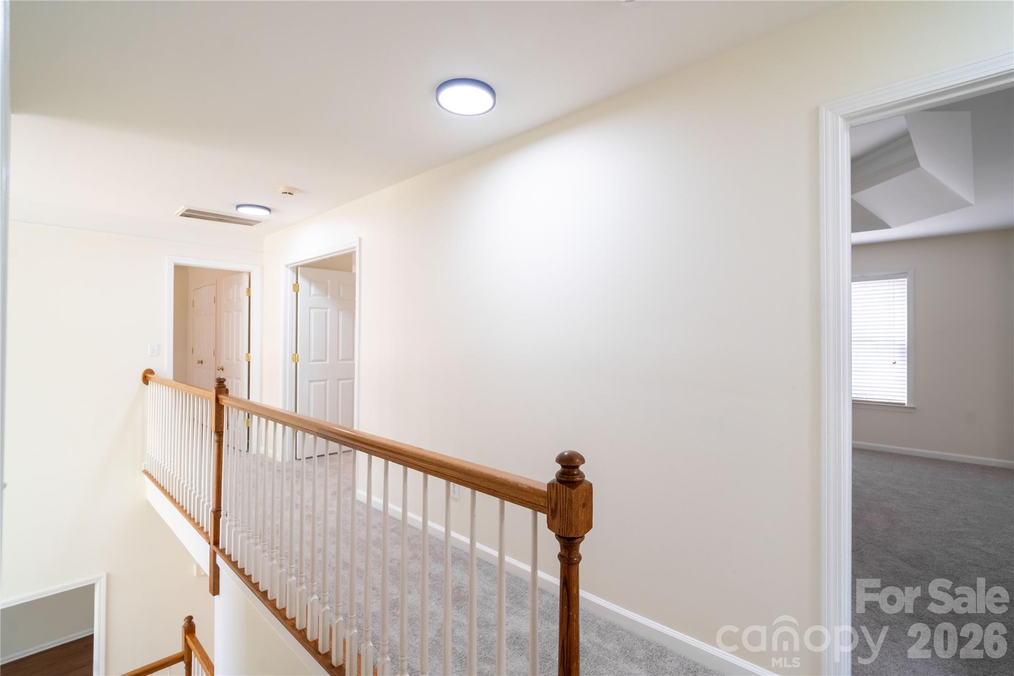 16905 Laureate Road, Unit 16 Huntersville, NC 28078 - Photo 34 of 38 a view of a hallway with a window