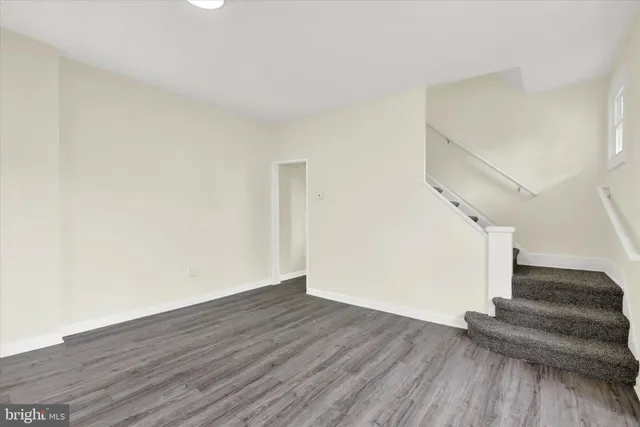 a view of entryway with wooden floor