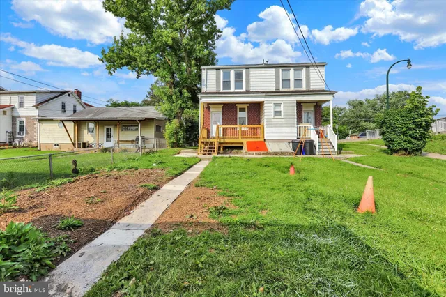 a front view of house with yard
