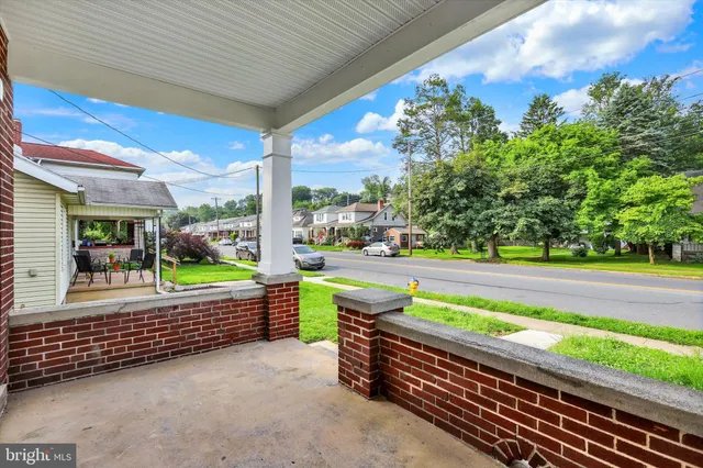 a garden view with a seating space