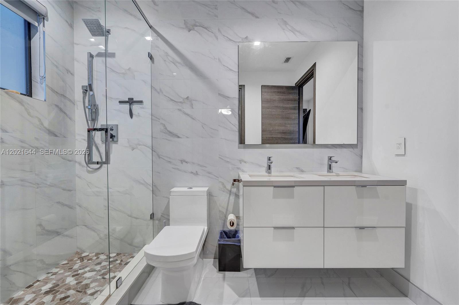 7800 Southwest 9th Terrace Miami, FL 33144 - Photo 55 of 64 a bathroom with a sink toilet and shower