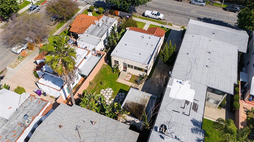 2285 Pine Avenue Long Beach, CA 90806 - Photo 9 of 25 an aerial view of a house with a yard and a large tree