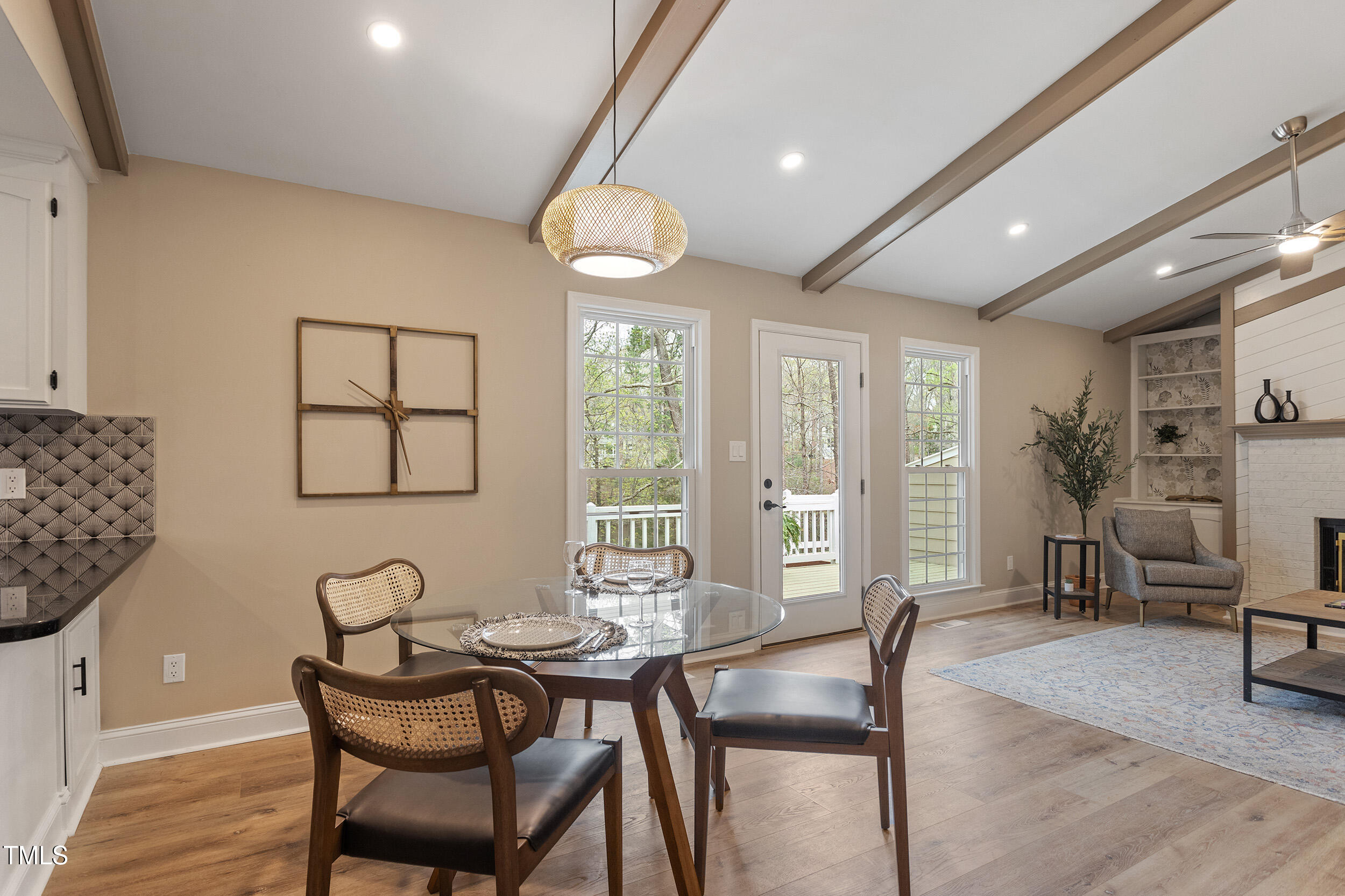 7825 Breckon Way Raleigh, NC 27615 - Photo 11 of 32 a view of a dining room with furniture window and outside view