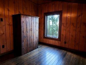 63 Ross Hollow Road New Kensington, PA 15068 - Photo 14 of 15 an empty room with wooden floor and windows with outer view