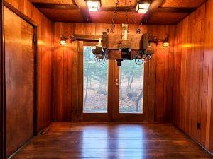 63 Ross Hollow Road New Kensington, PA 15068 - Photo 4 of 15 an empty room with wooden floor and windows