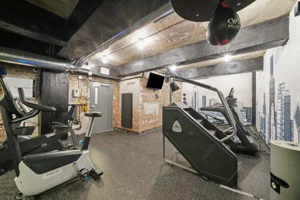 a view of a room with gym equipment