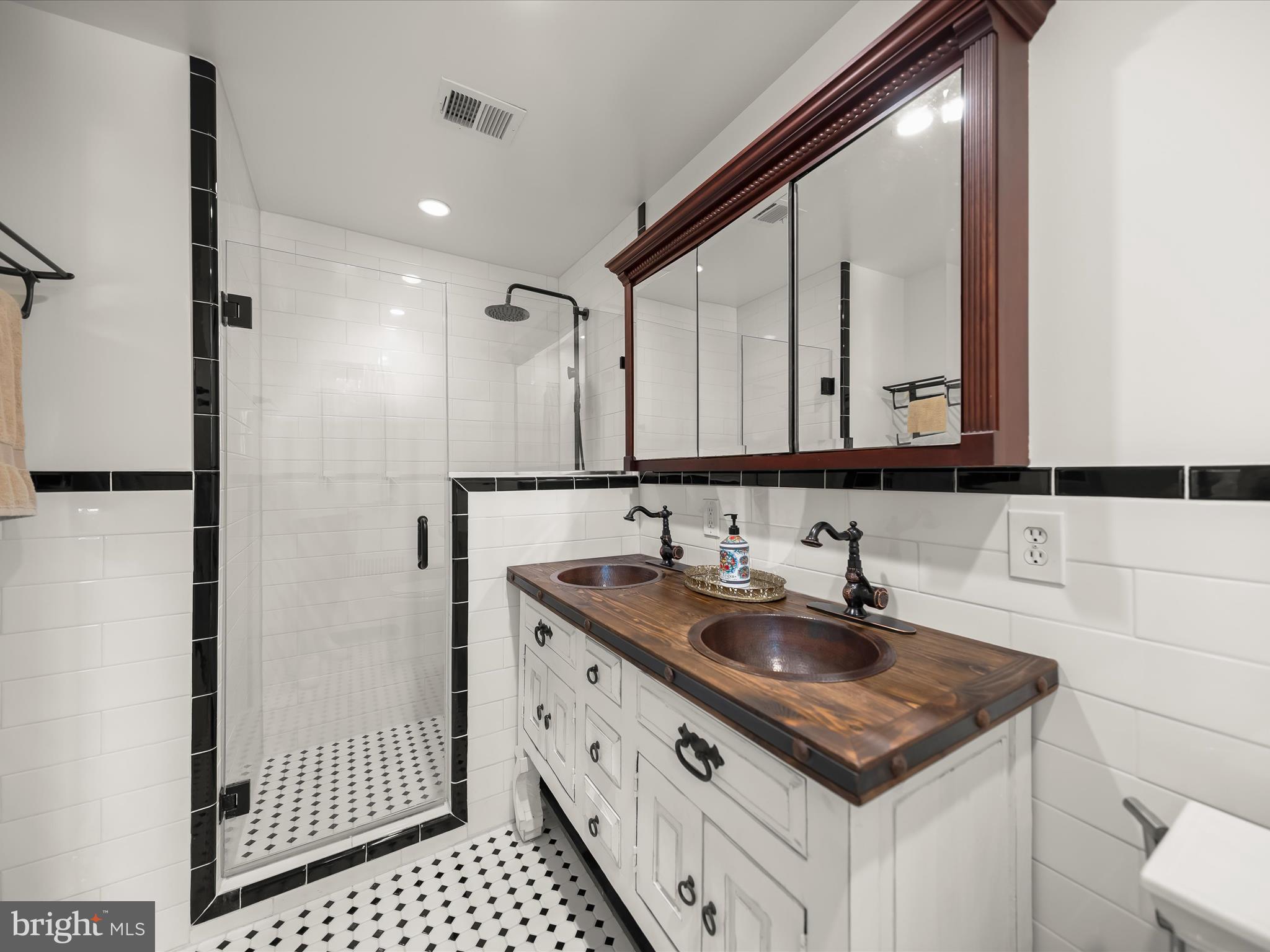 6310 Poe Road Bethesda, MD 20817 - Photo 33 of 46 Renovated Primary Bath w/custom copper sinks