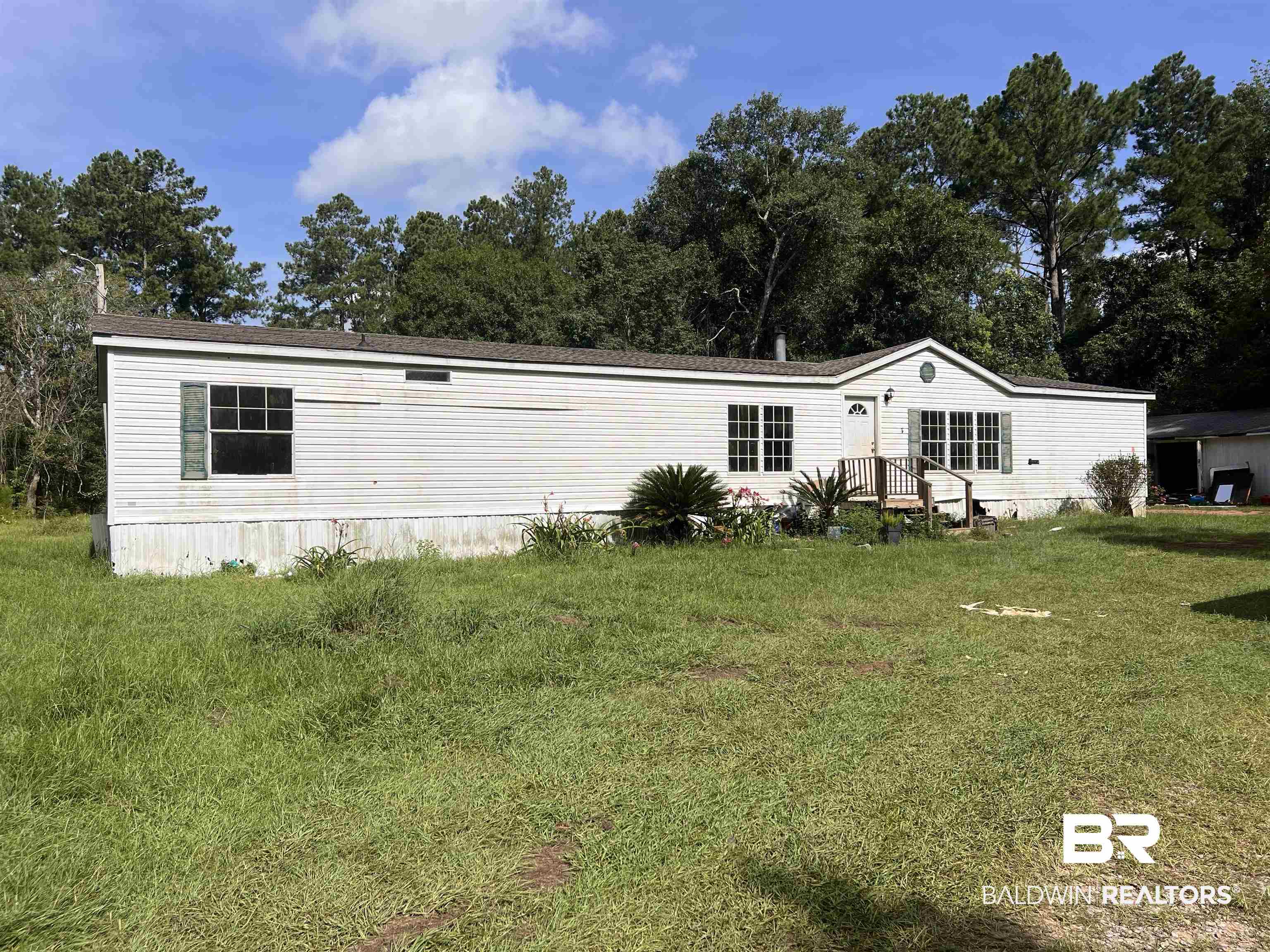 17349 County Road 87 Elberta, AL 36530 - Photo 1 of 1 Back of house with a yard