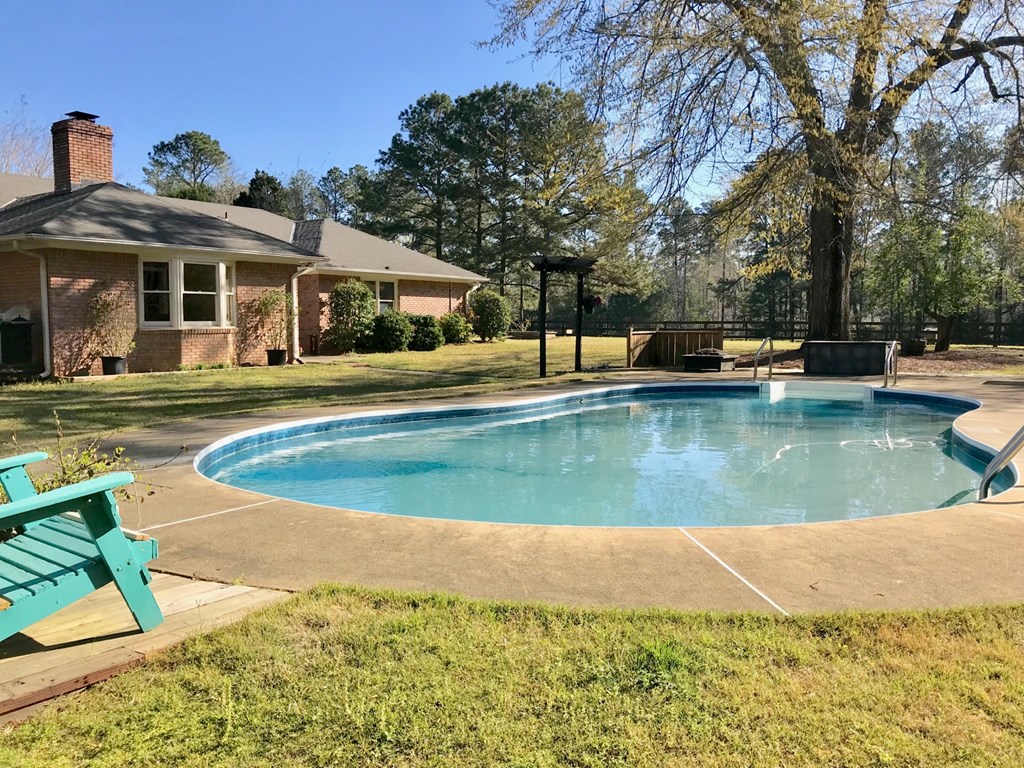 9802 County Line Road Midland, GA 31820 - Photo 9 of 15 a view of a house with pool and sitting area