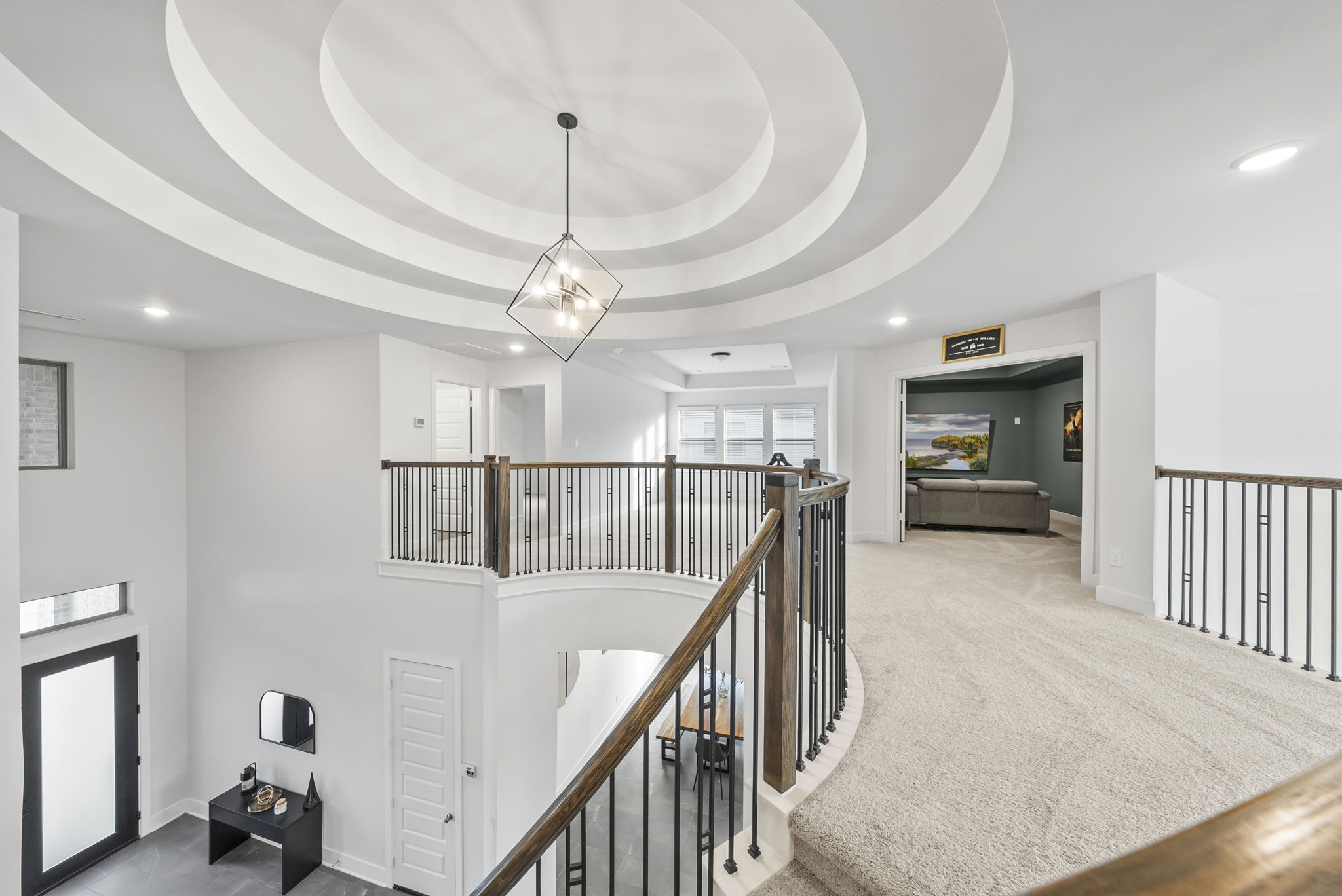 124 Low River Lane Georgetown, TX 78628 - Photo 23 of 38 a view of a hallway with wooden floor and stairs