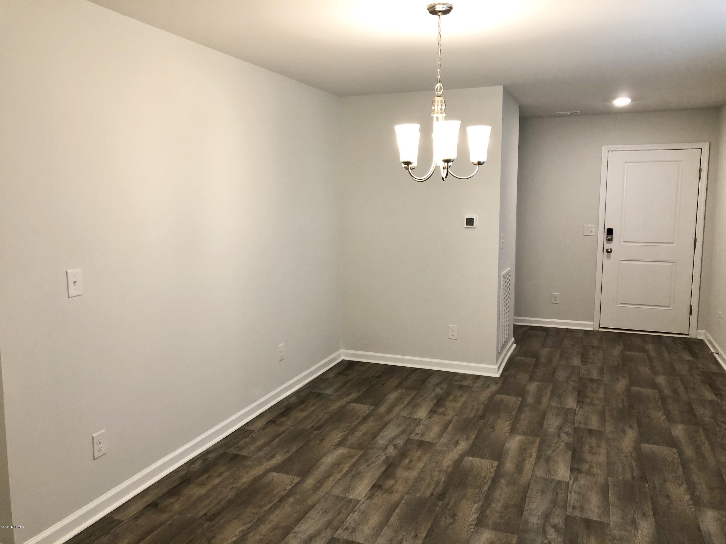 391 Ellis Road Southeast, Unit LOT #29 Bolivia, NC 28422 - Photo 4 of 29 Dining Area