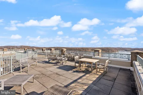 a view of a terrace with seating area