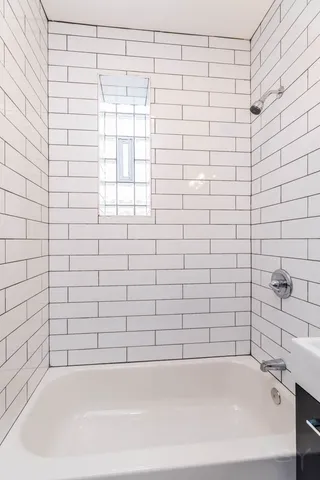 a bathroom with a bathtub