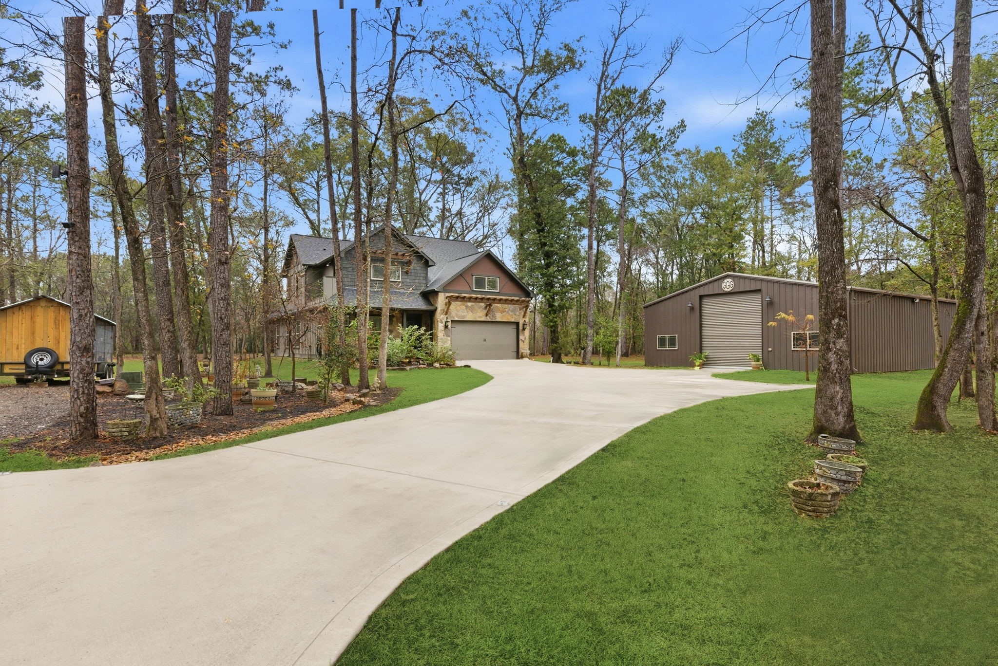 1480 Traylor Road Conroe, TX 77304 - Photo 5 of 25 a view of a house with a small yard and tree s