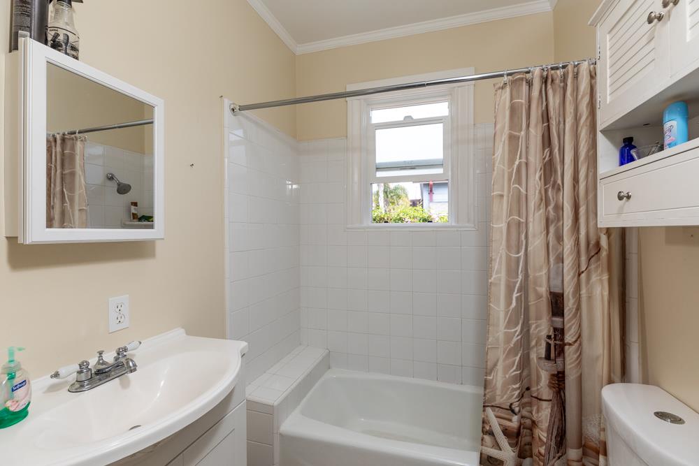 2211 Capitola Road Santa Cruz, CA 95062 - Photo 12 of 20 a bathroom with a sink a toilet and shower