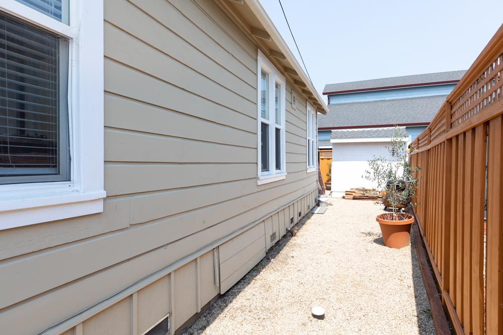 2211 Capitola Road Santa Cruz, CA 95062 - Photo 18 of 20 a view of a house with a backyard and furniture