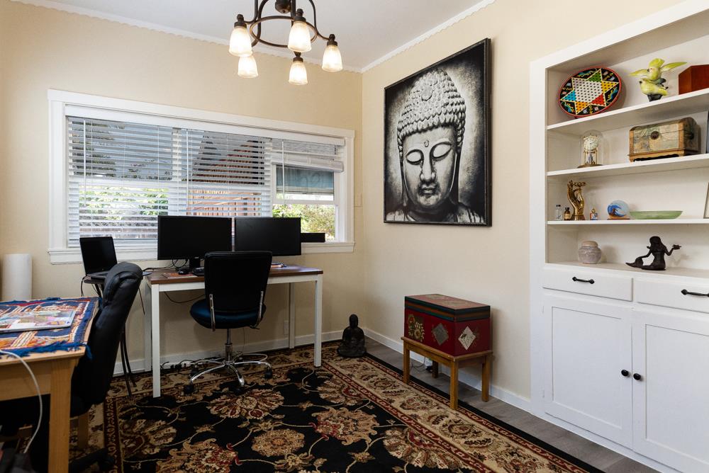 2211 Capitola Road Santa Cruz, CA 95062 - Photo 3 of 20 a view of a workspace with furniture and a window