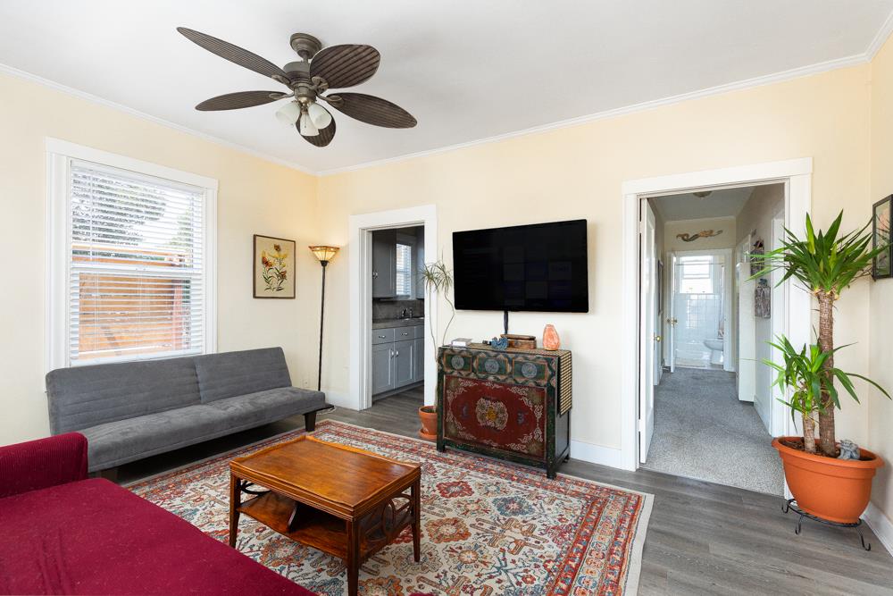 2211 Capitola Road Santa Cruz, CA 95062 - Photo 5 of 20 a living room with furniture and a flat screen tv