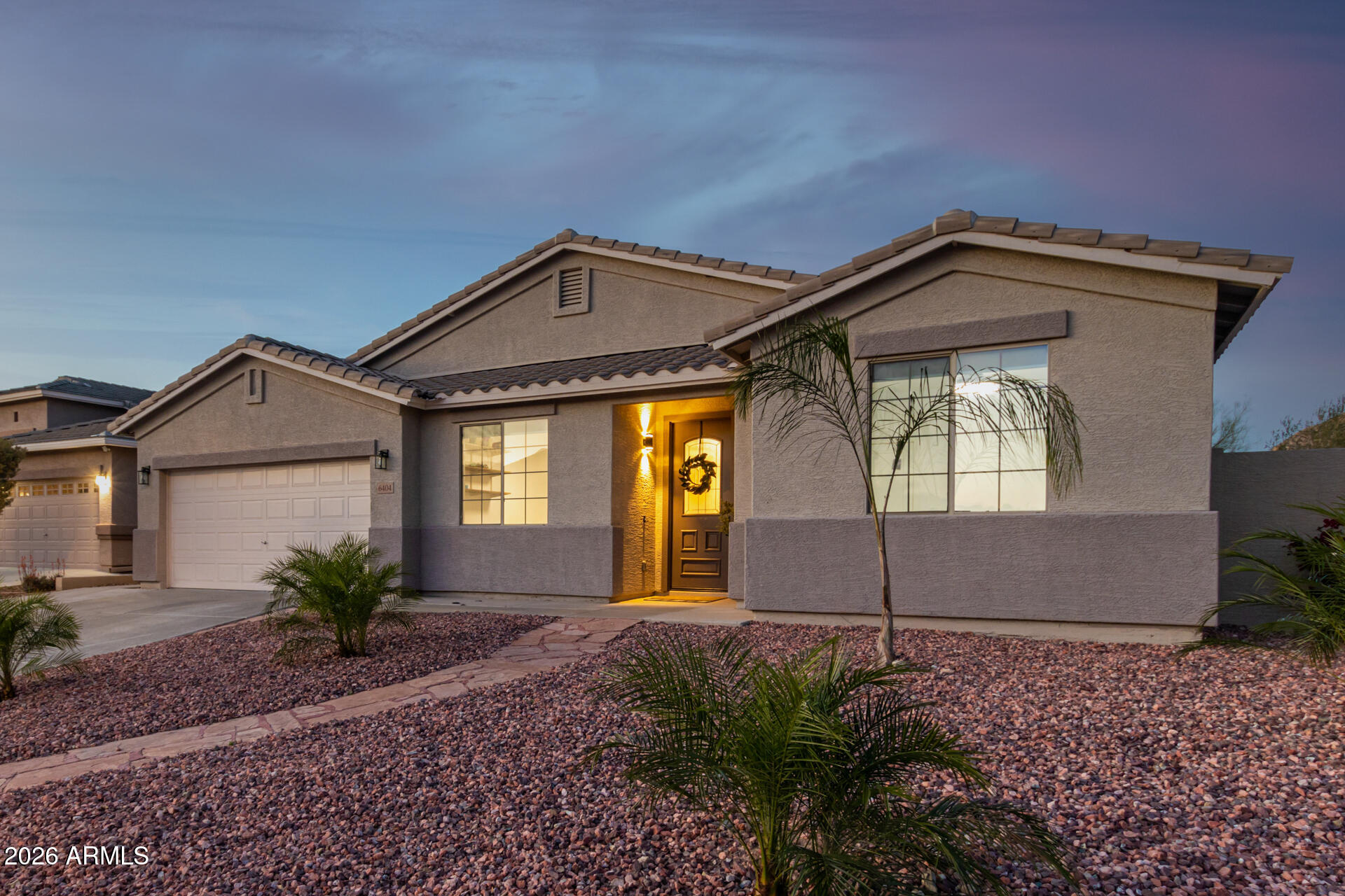 6404 West Black Hill Road Phoenix, AZ 85083 - Photo 3 of 33 a front view of a house with garden