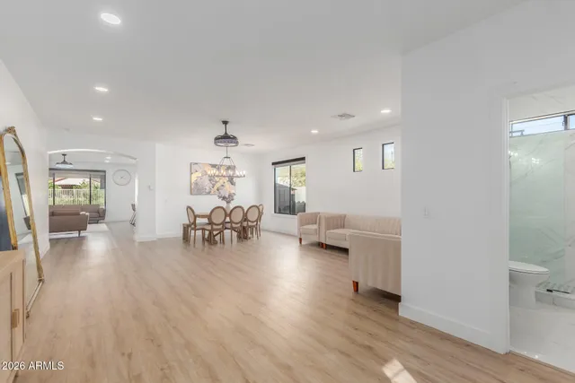 a living room with furniture and a table