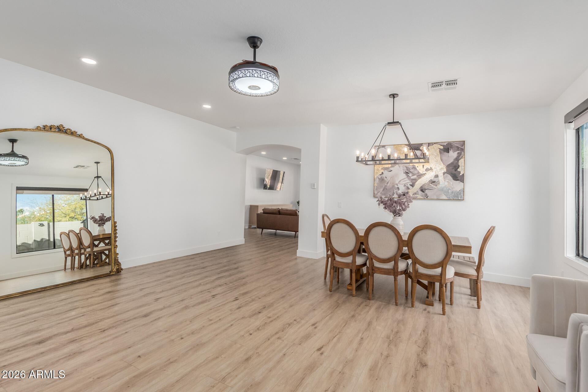 6404 West Black Hill Road Phoenix, AZ 85083 - Photo 5 of 33 a view of a dining room with furniture and wooden floor