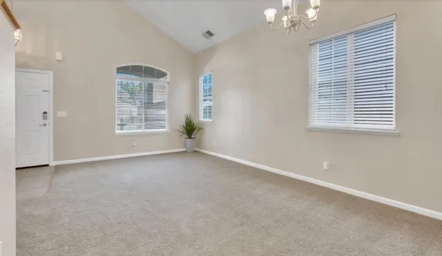 an empty room with windows