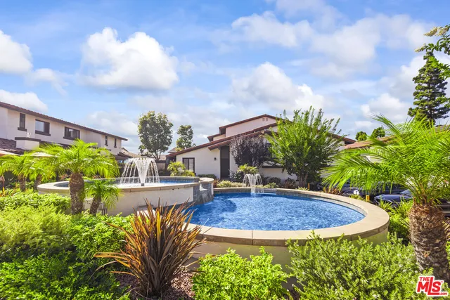 a view of a backyard with plants