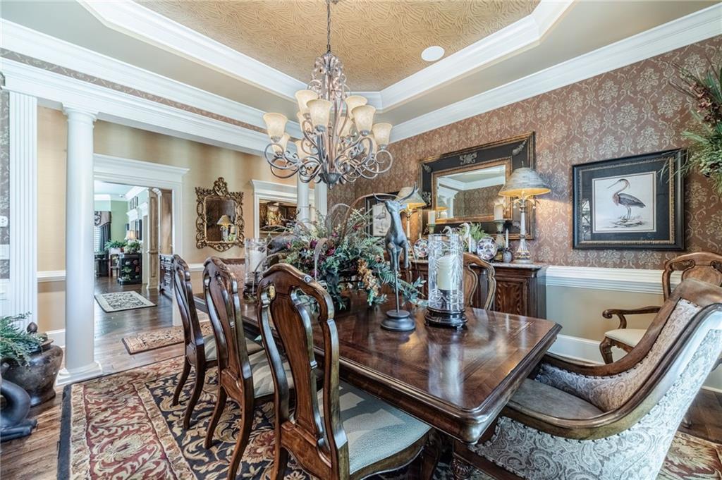 1600 Beagle Run Monroe, GA 30656 - Photo 19 of 103 a view of a dining room with furniture and chandelier