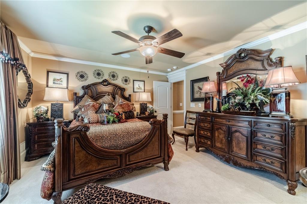 1600 Beagle Run Monroe, GA 30656 - Photo 25 of 103 a bed room with furniture and a flat screen tv