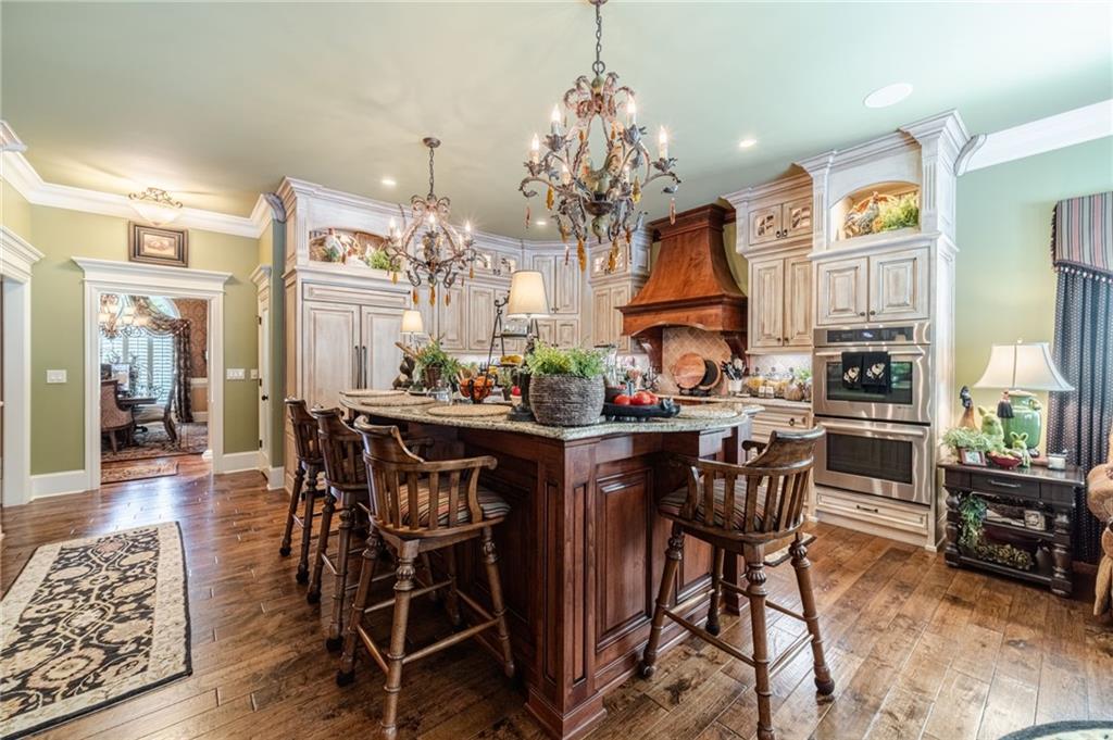 1600 Beagle Run Monroe, GA 30656 - Photo 28 of 103 a view of a dining room with furniture window and wooden floor
