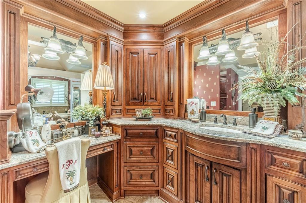 1600 Beagle Run Monroe, GA 30656 - Photo 49 of 103 a kitchen with a sink stove and cabinets
