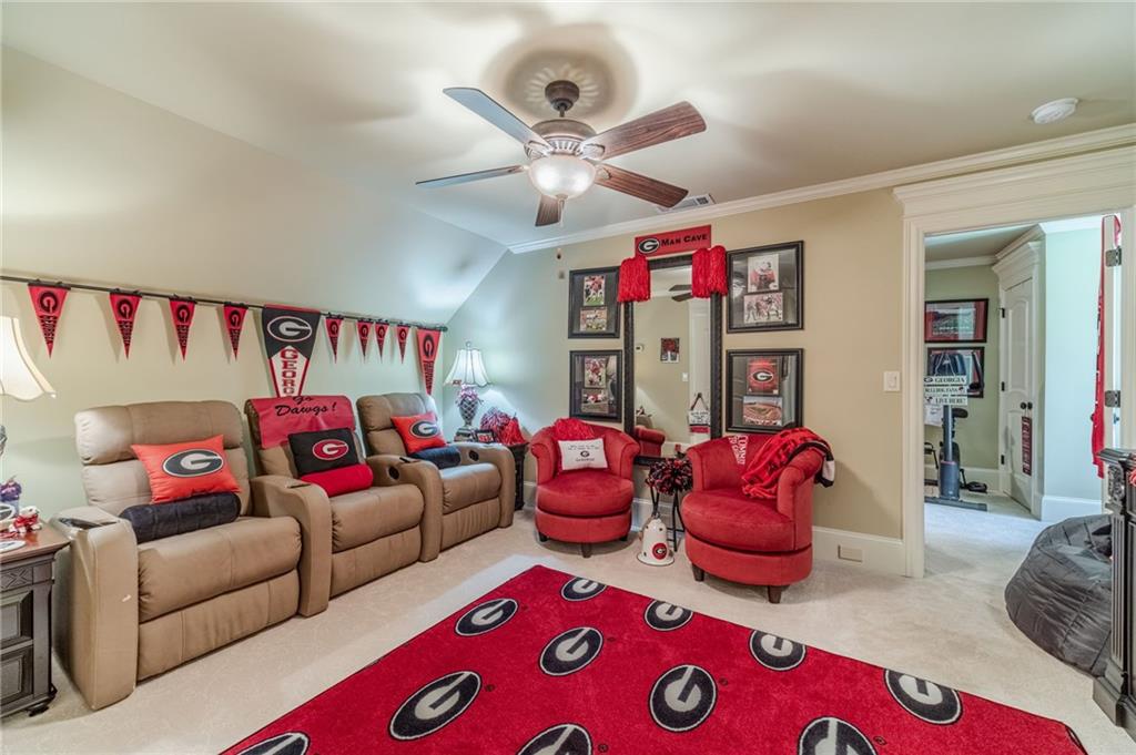 1600 Beagle Run Monroe, GA 30656 - Photo 58 of 103 a living room with furniture and a chandelier