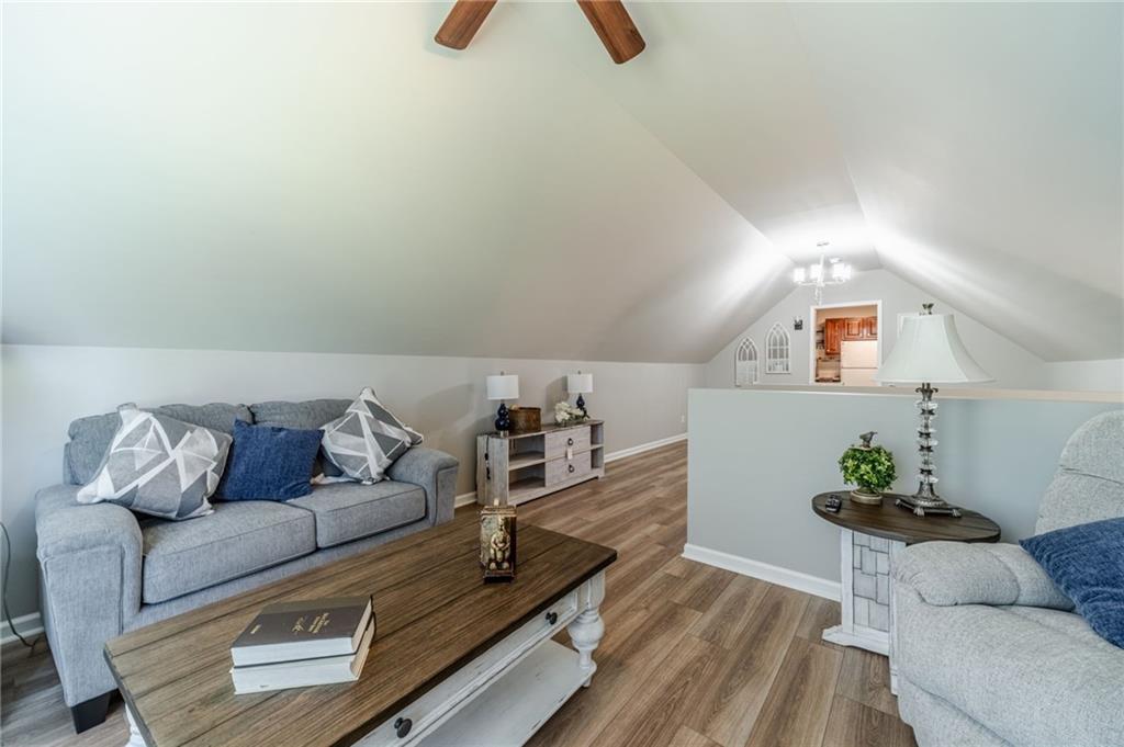 1600 Beagle Run Monroe, GA 30656 - Photo 69 of 103 a living room with furniture and a couch